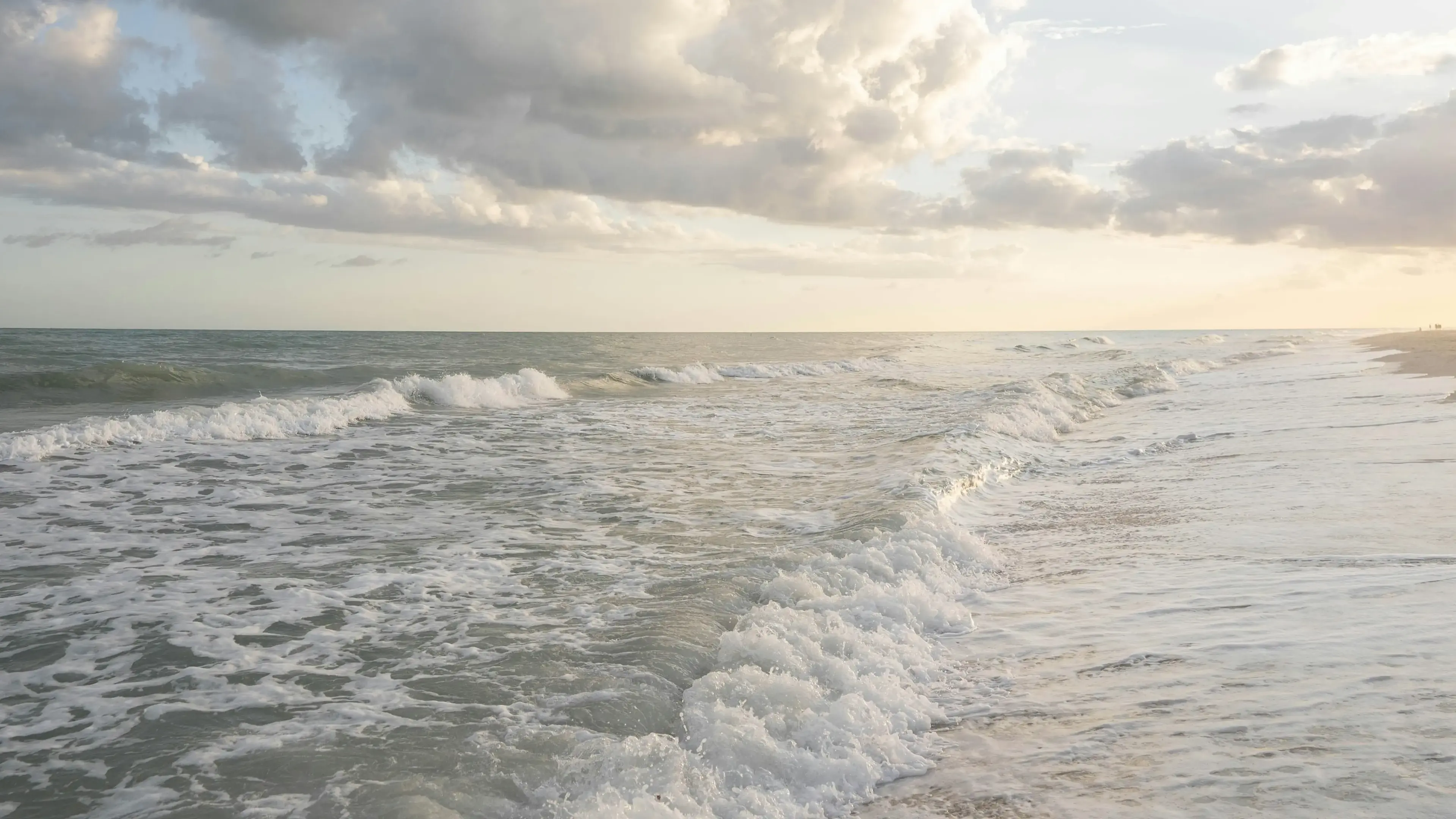 Gulf surf rolling onto Fort Myers Beach
